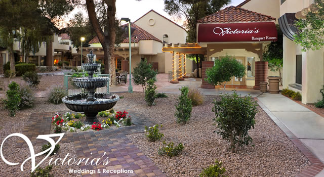 Exterior courtyard and fountain at Victoria's Family, with the Victoria's Banquet Room storefront sign
