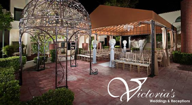 Outdoor gazebo ceremony setup with chiavari chairs
